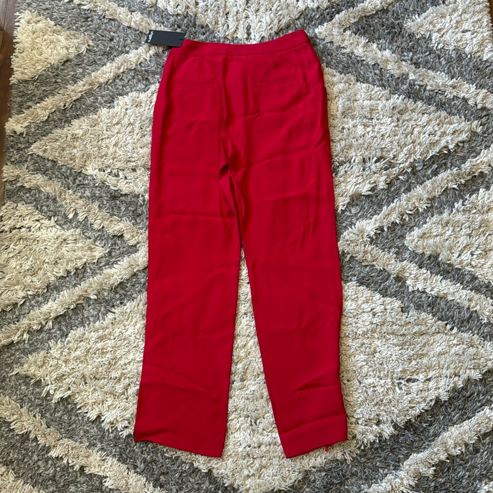 Women’s red designer trouser pants.  New with tags.